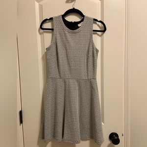 Black and white diamond print dress. Mock neck.